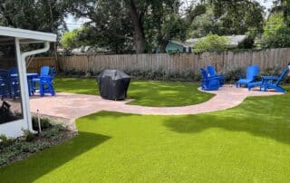 Artificial grass lawn beside clean landscape edging